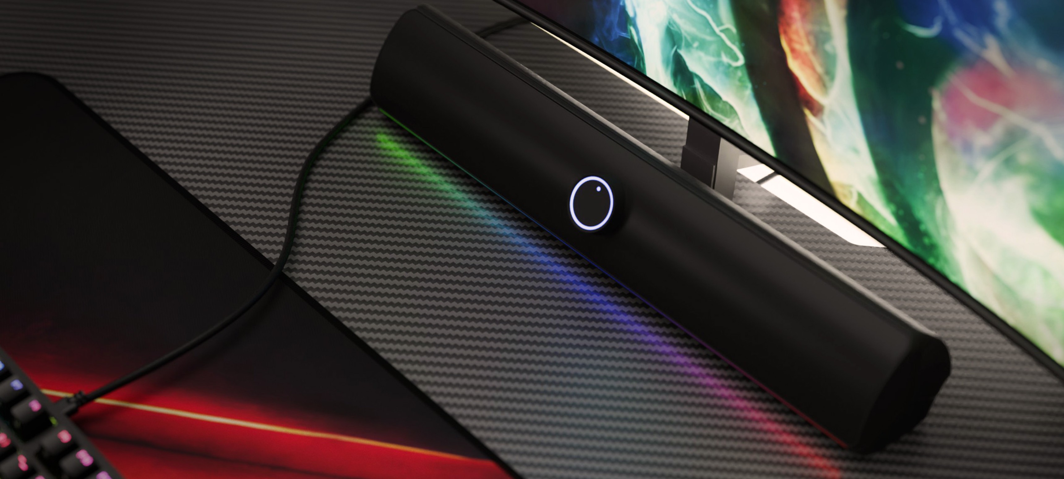 Soundbar Bluetooth o eleganckiej, czarnej konstrukcji z podświetlanym przyciskiem sterowania i kolorowymi akcentami LED.