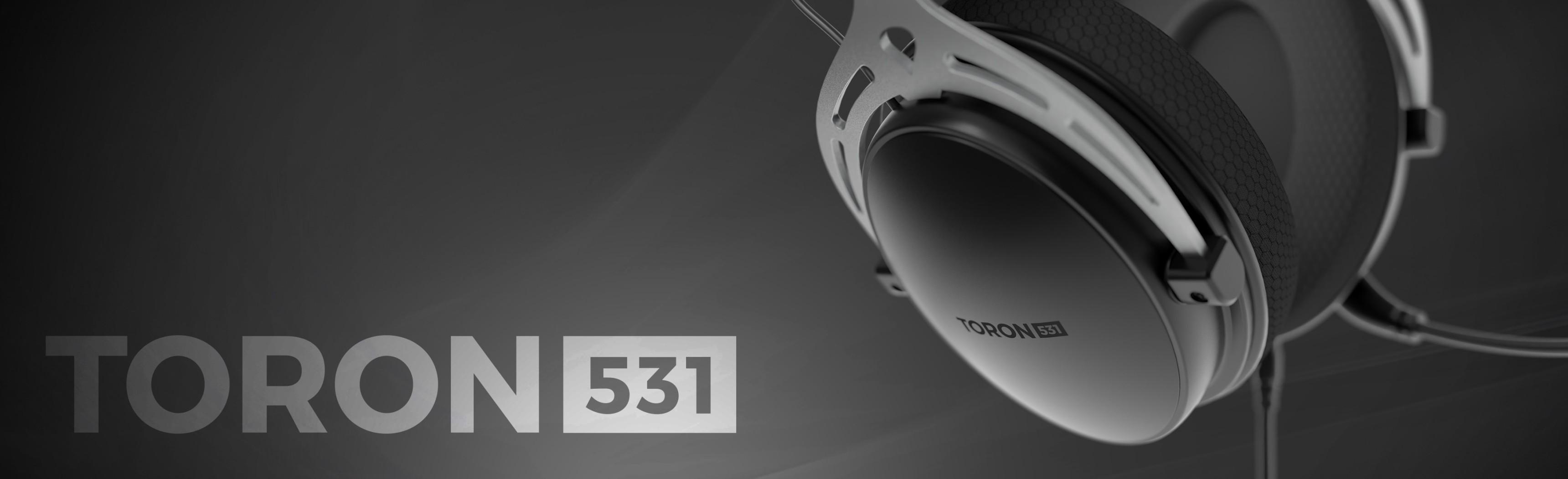 Czarne słuchawki nauszne Genesis Toron 531 z mikrofonem o eleganckim wyglądzie.
