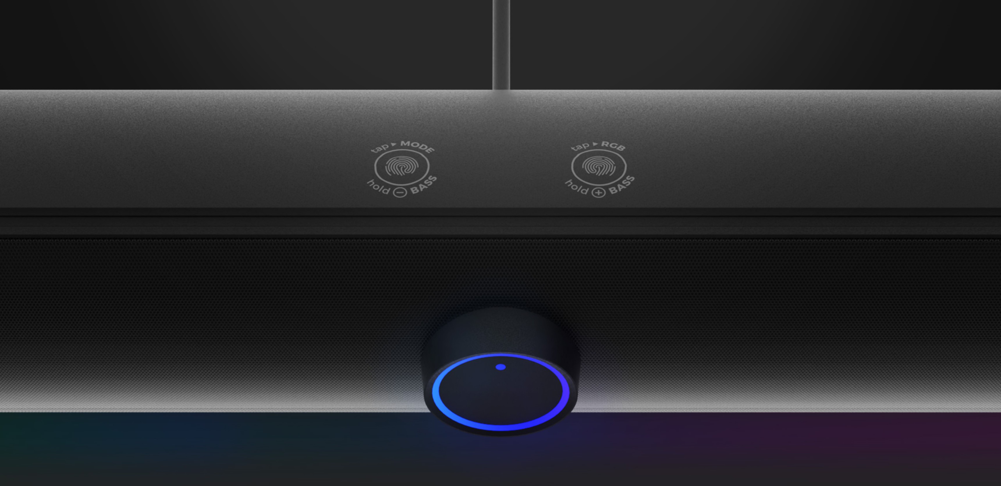 Zbliżenie na soundbar Genesis Helium 312BT z przyciskami sterowania i niebieskim wskaźnikiem LED