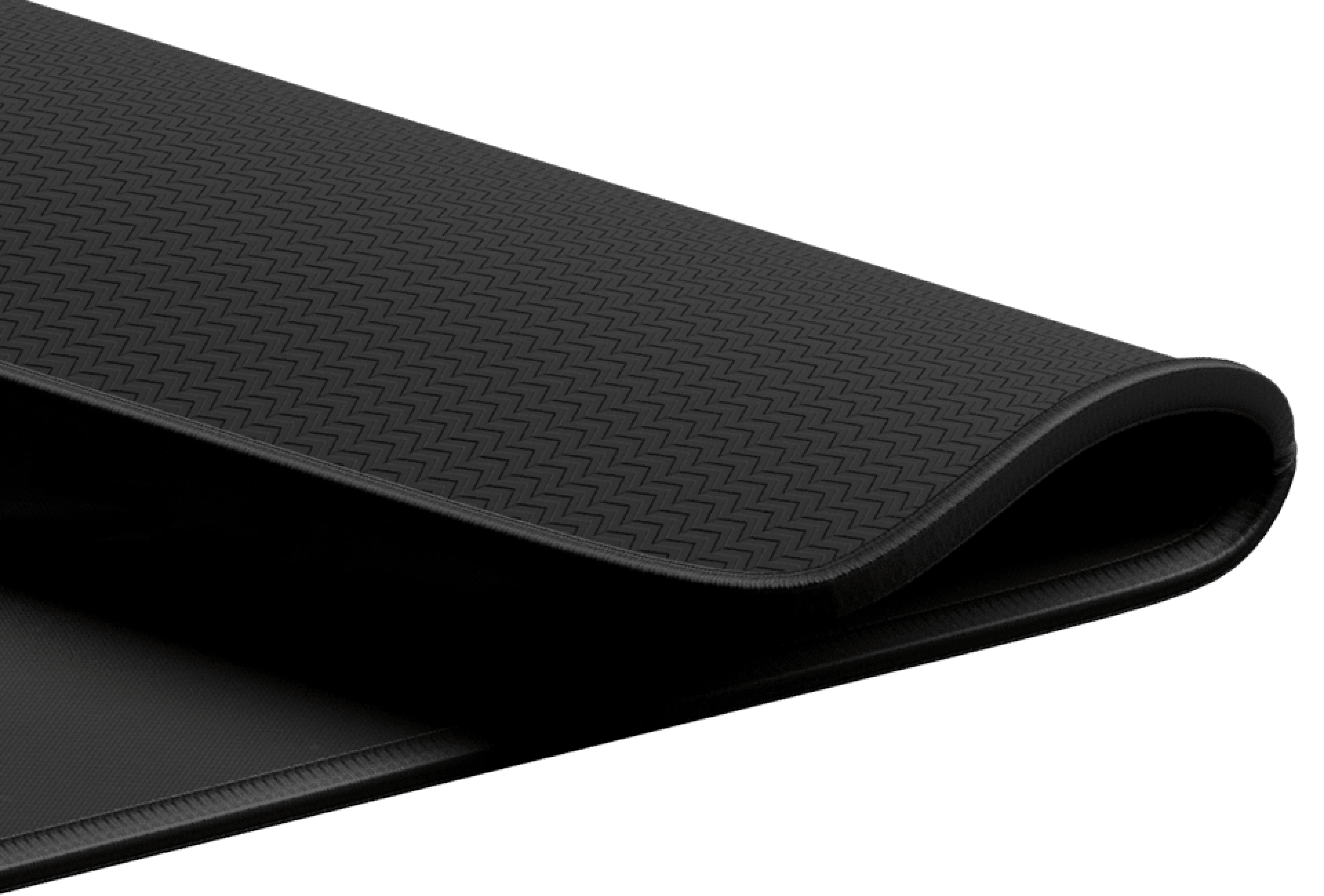 Czarna podkładka pod mysz Genesis Carbon 500 z teksturowaną powierzchnią, o wymiarach 300x250 mm, częściowo zwinięta na krawędzi